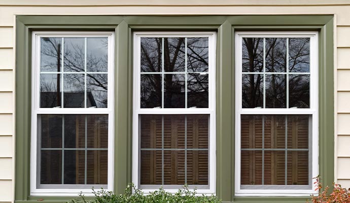 Installed double hung windows on a house