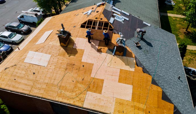 Professional team installing new roof